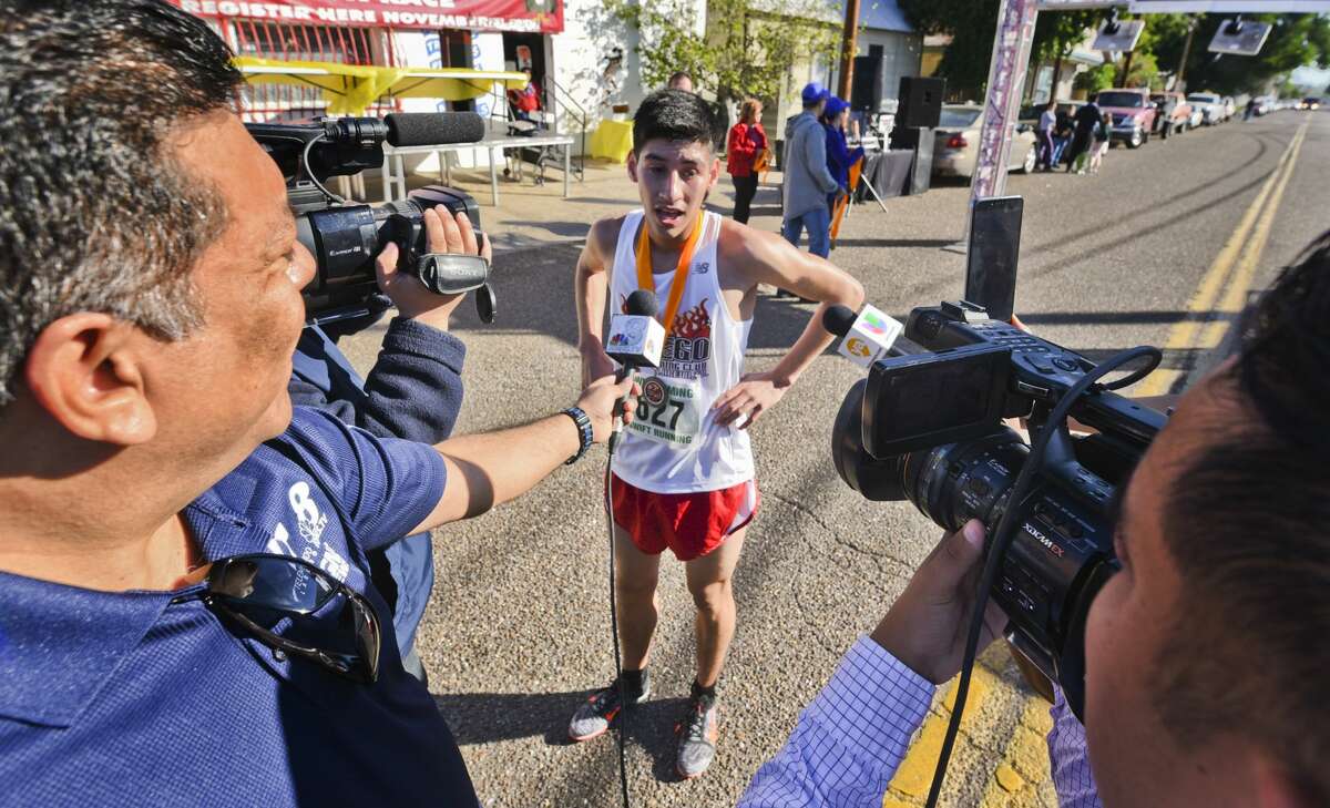 Marlon Amador speaks to the media after winning the 37th Annual Guajolote Run on Thursday.