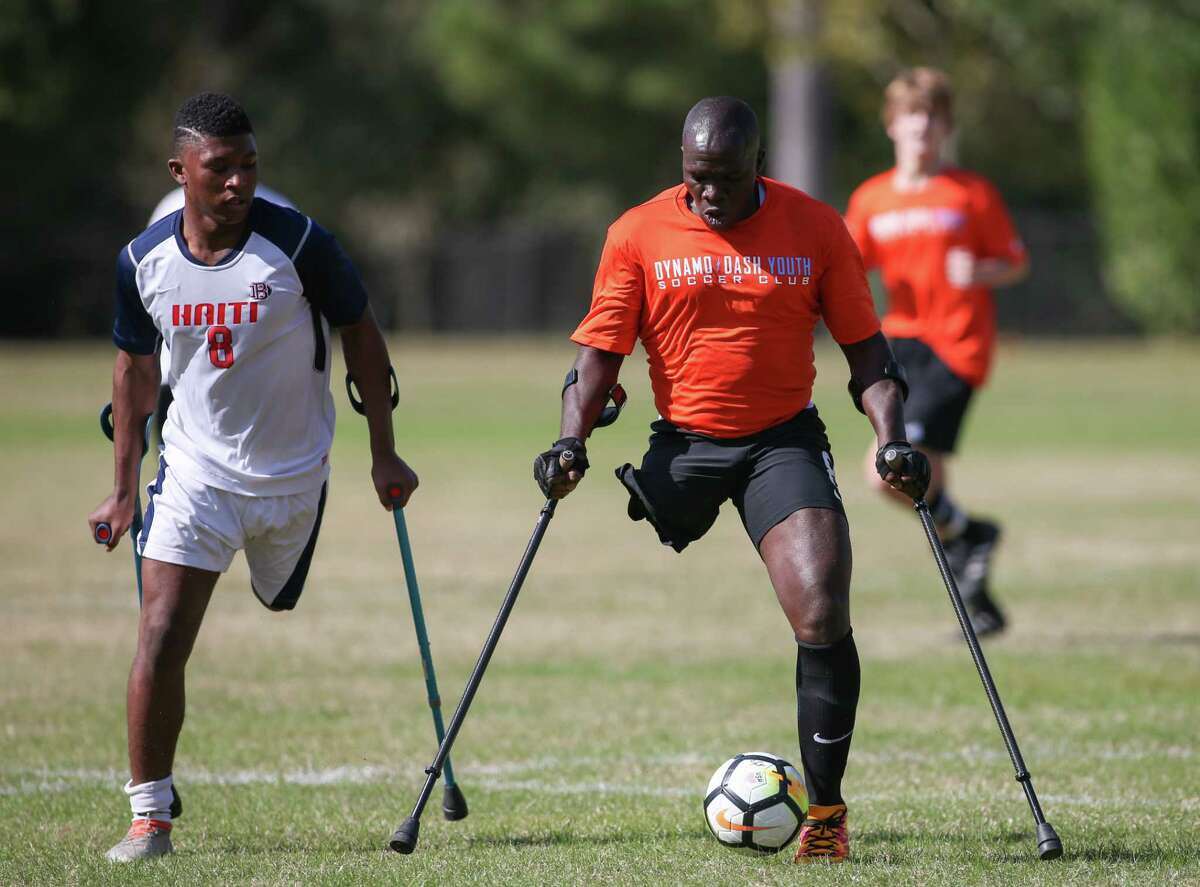 Players use crutches for balance in the Texas Regional Amputee Soccer exhibition match between the Haitian National Amputee Soccer Team and ﻿Lone Star Amputee Soccer Houston team at Lents Family Park. The Americans beat the ranked Haitians, 6-3.