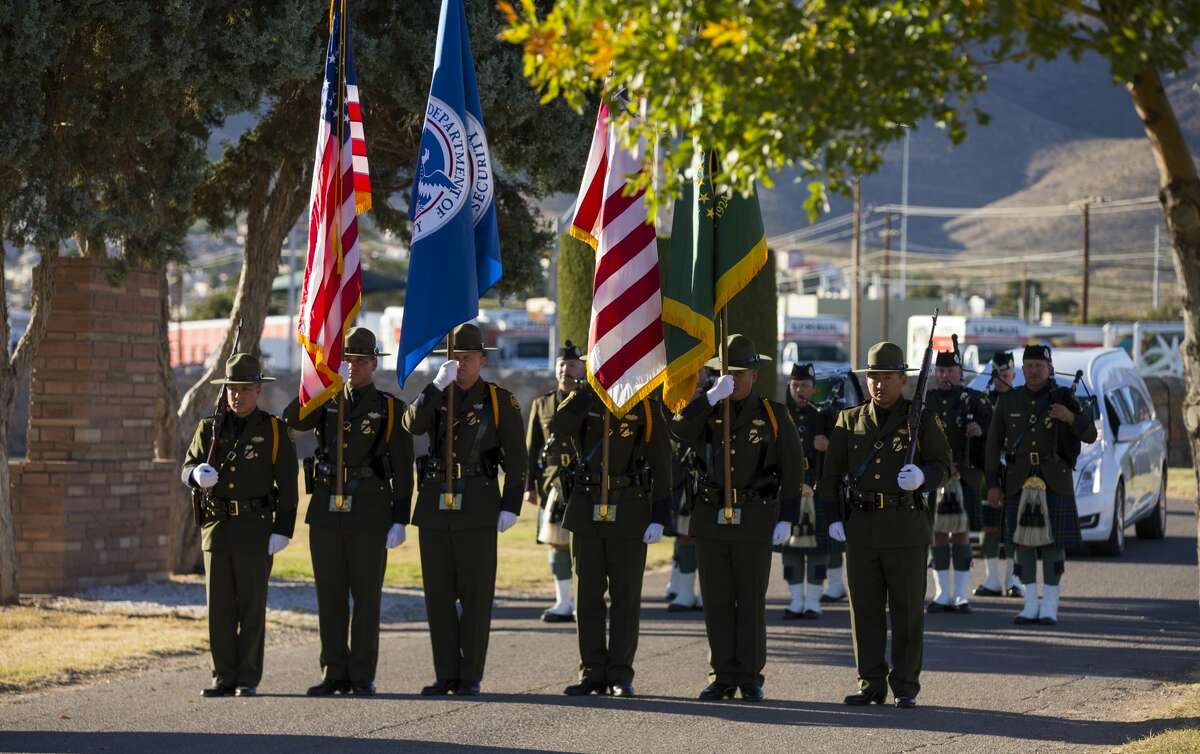 U.S. Border Patrol Agents are seen at the funeral service for fellow Border Patrol Agent Rogelio Martinez at Restlawn Cemetery, Saturday, November 25, 2017, in El Paso, Texas. Martinez, who is an El Paso native, was killed in the line of duty Sunday near Van Horn. Photo by Ivan Pierre Aguirre for San Antonio Express-News