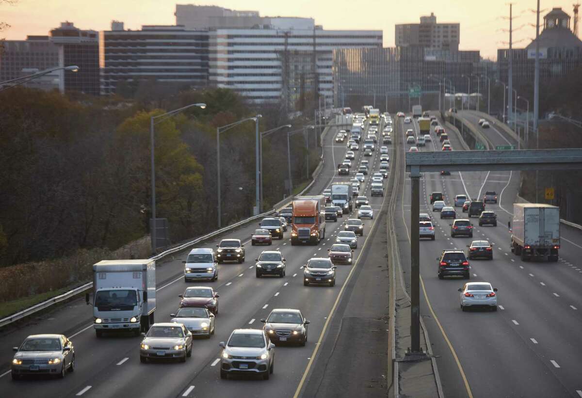 Traffic moves along I-95 during rush hour near Exit 9 in Stamford, Conn., on Monday, Nov. 20, 2017.
