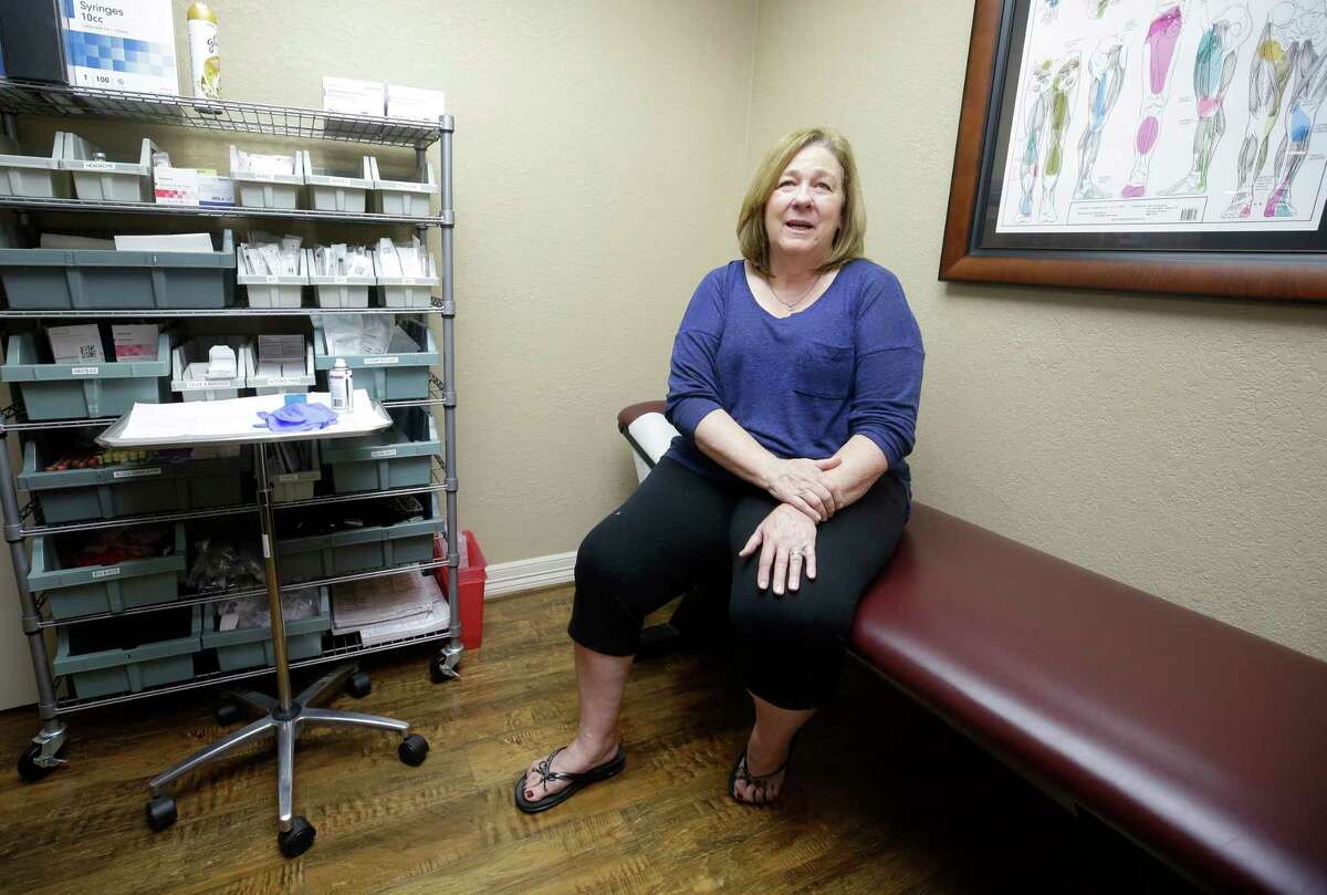 Martha Barden, of Friendswood, received an infusion of stem cells at Premier Medical Group in Pearland for a painful knee. Critics question the effectiveness of the therapy, but Barden estimates she's probably 80 percent better.