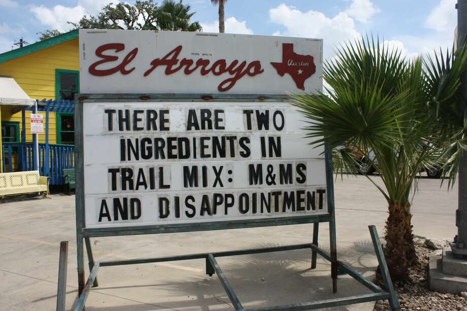 El Arroyo signs compiled for a epic book - Houston Chronicle