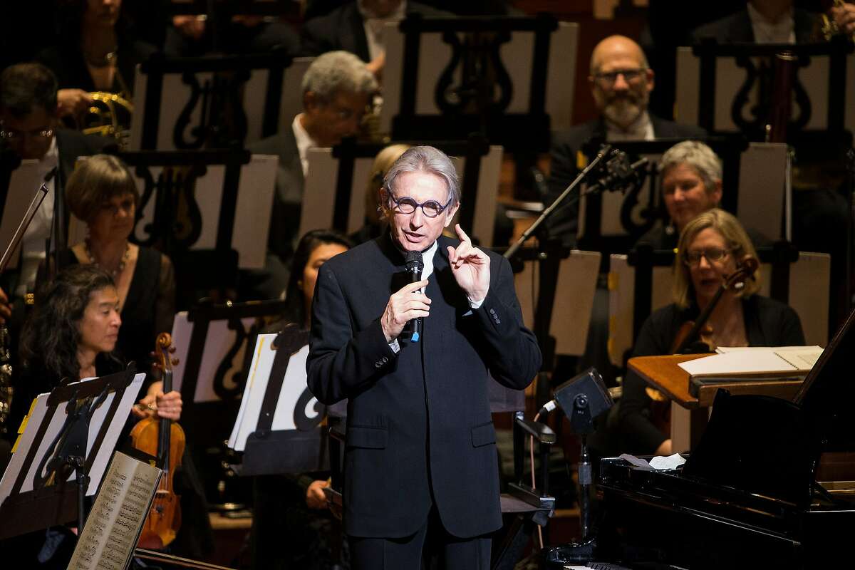 Michael Tilson Thomas is told a story about himself