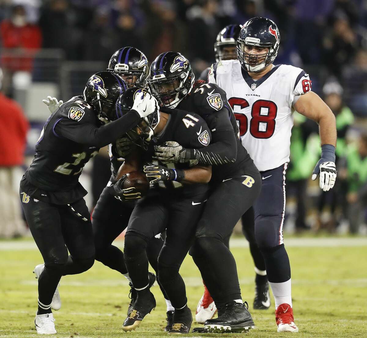 Baltimore Ravens cornerback Anthony Levine (41) celebrates his interception with teammates during the fourth quarter of an NFL football game at M & T Bank Stadium on Monday, Nov. 27, 2017, in Baltimore. ( Brett Coomer / Houston Chronicle )
