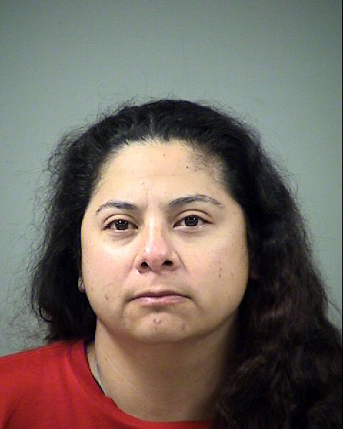 Tabita Sandoval Guerrero, 41, now faces a charge of domestic assault causing bodily injury. She was booked into the Bexar County Jail on a $3,500 bond. She bailed out of jail Tuesday morning.