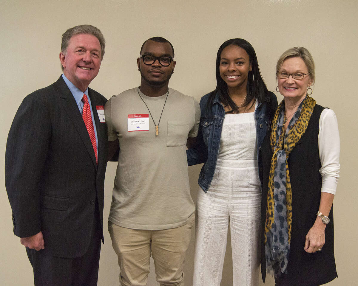InsurMark Folds of Honor 2017 recipients Joshua Long, second from left, and Kiera Bradley, second from right, are congratulated by Steve and Becky Kerns.