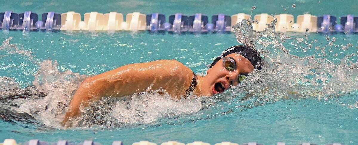 Wilton's Emma Babashak swims to an eighth-place finish in the 500 yard freestyle during Saturday's State Open girls swimming championship meet at Yale University in New Haven.