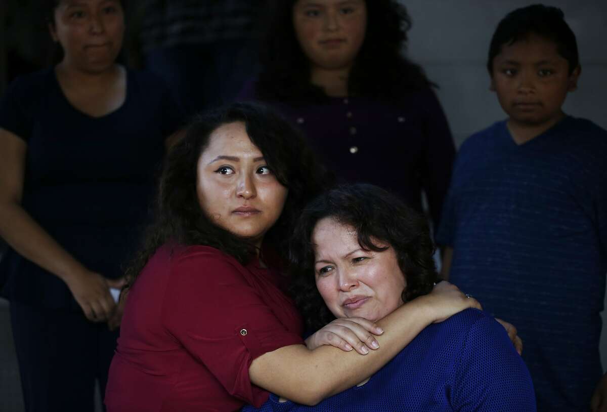 Vianney Sanchez, 23 (left), comforts her mother, Maria Mendoza-Sanchez, after the family met with Sen. Dianne Feinstein.