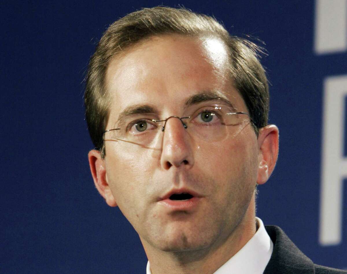 FILE - In this May 1, 2006 file photo, former Deputy U.S. Health and Human Services Secretary Alex Azar, speaks at a meeting in Jackson, Miss. President Donald TrumpÂ?’s pick for health secretary is a former drug company executive whoÂ?’s already taking heat from Democrats over pricing and conflicts. But as Azar faces his first nomination hearing, even some of those say they see flickers of evidence that he can be trusted to shift the health care debate from partisan confrontation. (AP Photo/Rogelio Solis)