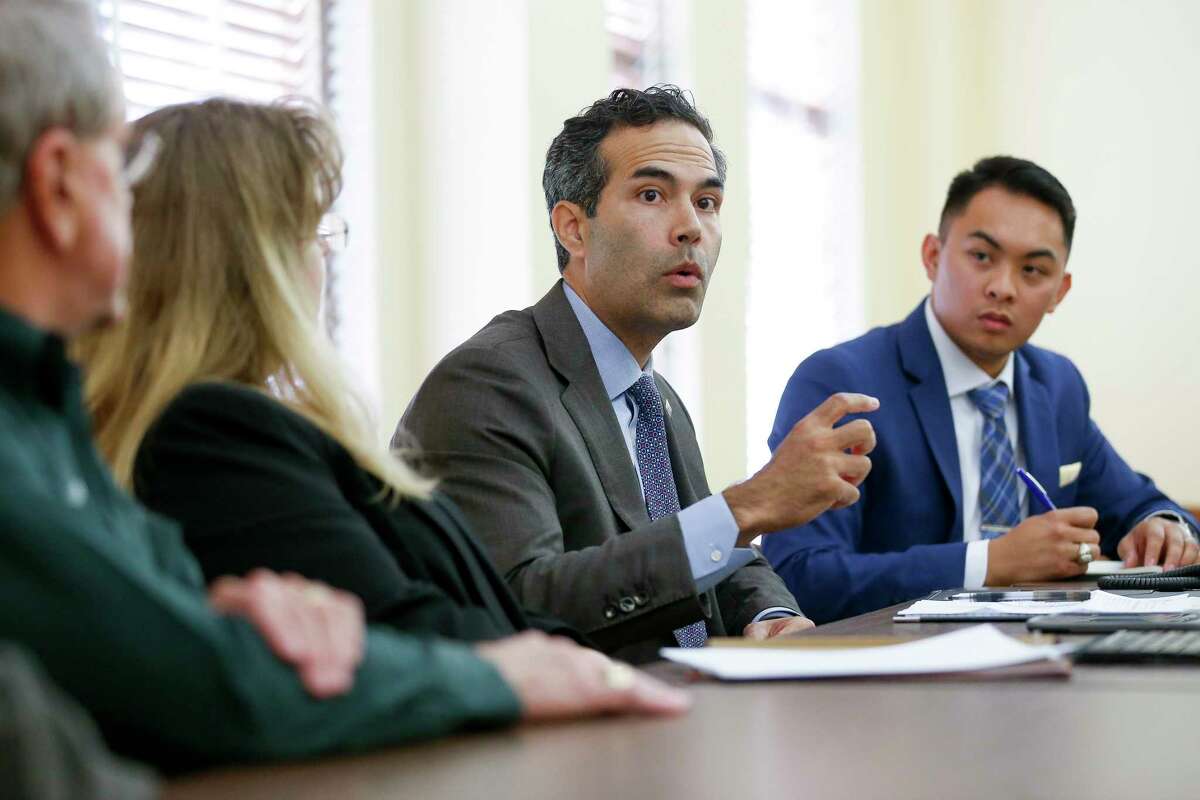 Texas Land Commissioner George P. Bush, center, talks to Fort Bend County residents and officials during a roundtable discussion earlier this fall on the state of Hurricane Harvey recovery. ﻿