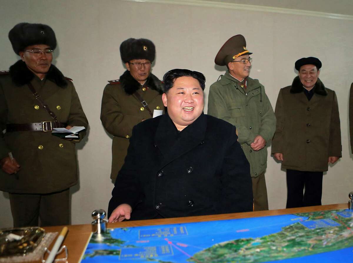 In this photo provided on Thursday, Nov. 30, 2017, by the North Korean government, North Korean leader Kim Jong Un inspects an intercontinental ballistic missile test in North Korea on Wednesday, Nov. 29. Independent journalists were not given access to cover the event depicted in this image distributed by the North Korean government. The content of this image is as provided and cannot be independently verified. Korean language watermark on image as provided by source reads: "KCNA" which is the abbreviation for Korean Central News Agency. (Korean Central News Agency/Korea News Service via AP)
