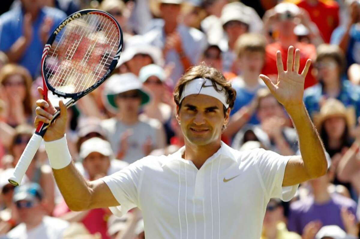 Roger Federer of Switzerland celebrates match point during his match against Jurgen Melzer of Austria on Day Seven of the Wimbledon Lawn Tennis Championships at the All England Lawn Tennis and Croquet Club on June 28, 2010 in London, England.