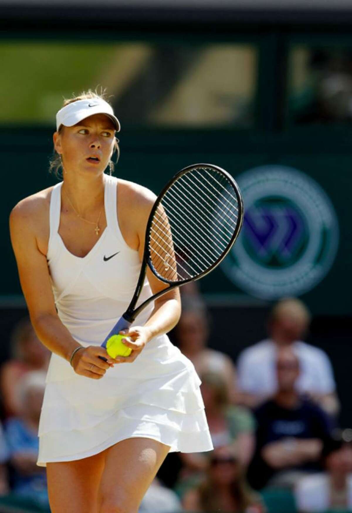 Maria Sharapova of Russia in action during her match against Serena Williams of USA on Day Seven of the Wimbledon Lawn Tennis Championships at the All England Lawn Tennis and Croquet Club on June 28, 2010 in London, England.