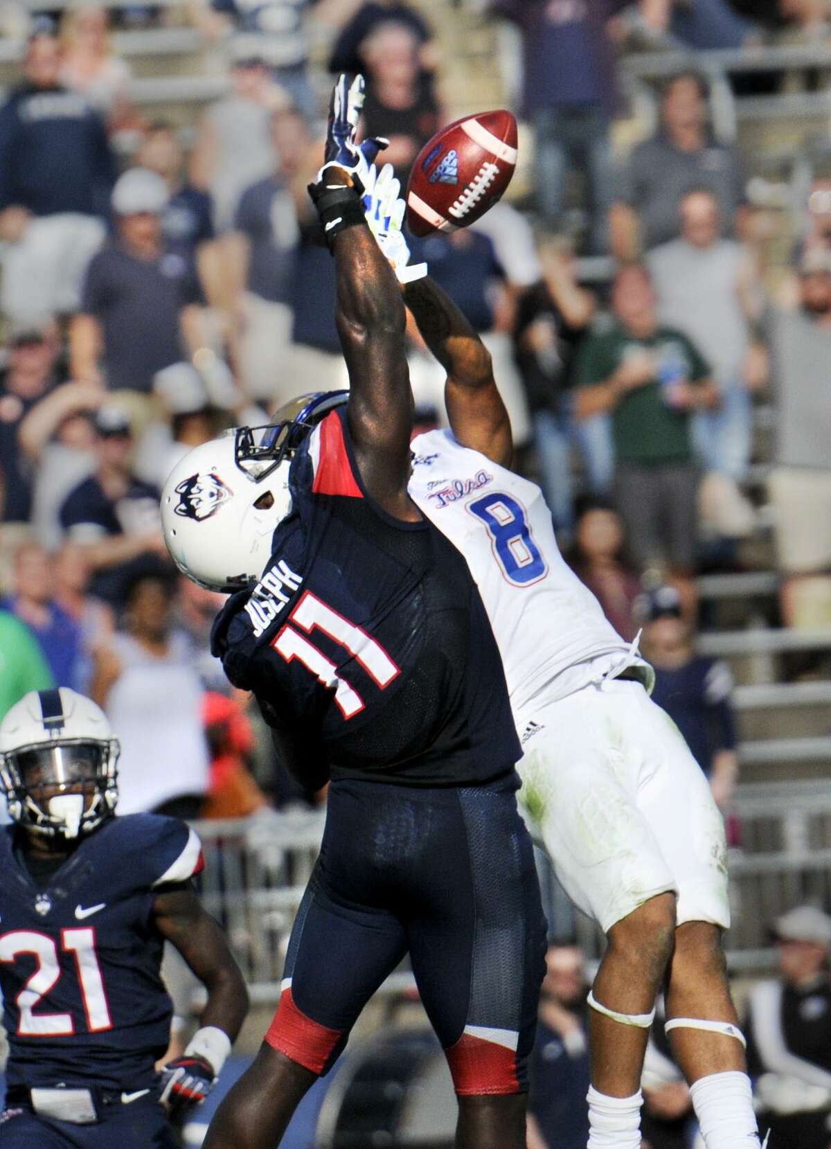 UConn linebacker Junior Joseph breaks up a pass intended for Tulsa wide receiver Keenen Johnson in the final seconds Oct. 21 in East Hartford.