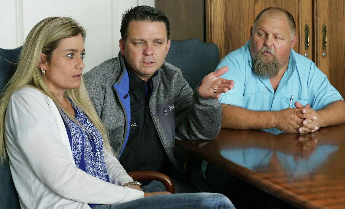 Cheryl Ramsey, left to right, her husband Gary Ramsey and Gary's brother Ronald Ramsey, gather in the law office of Maloney and Campolo to talk about the death of Gary and Ronald's mother Therese Ramsey Rodriguez who was killed in the Sutherland Springs shootings, on Wednesday, Nov. 29, 2017.