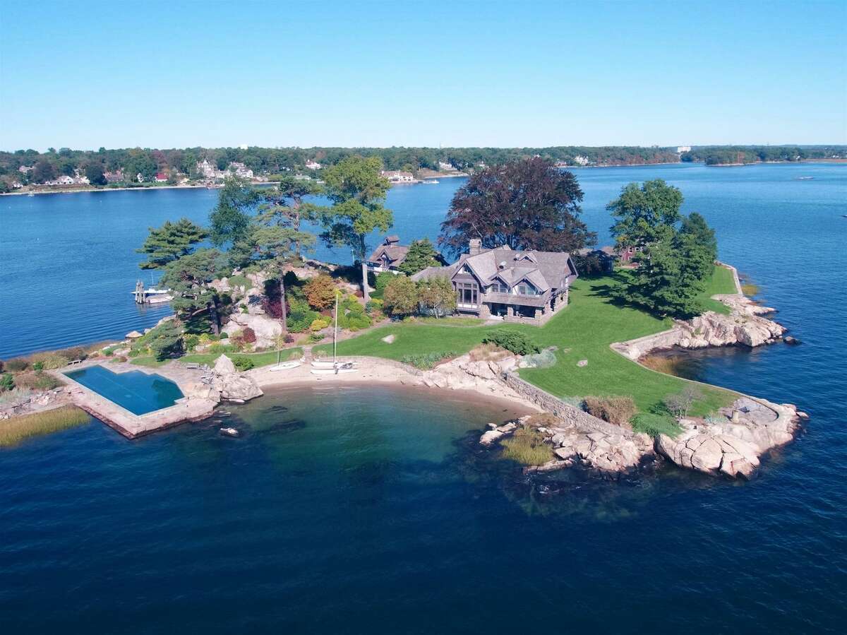 Tavern Island is back on the market for $8.7 million. Accessed via a five minute boat ride from the mainland address at 75 Bluff Avenue in Rowayton, the island compound has been immaculately maintained and includes five structures.