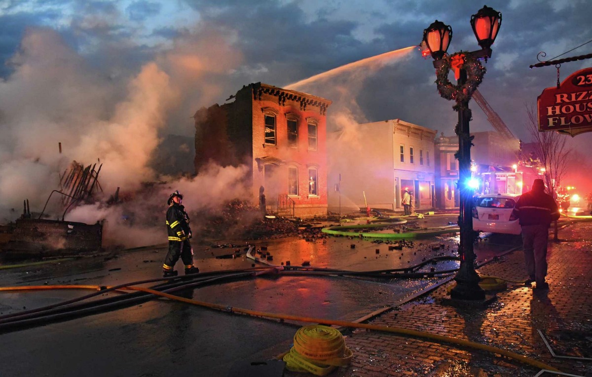 Firefighters from around the region work to control a multi-structure fire on Remsen Street on Thursday, Nov. 30, 2017 in Cohoes, N.Y. (Lori Van Buren / Times Union)
