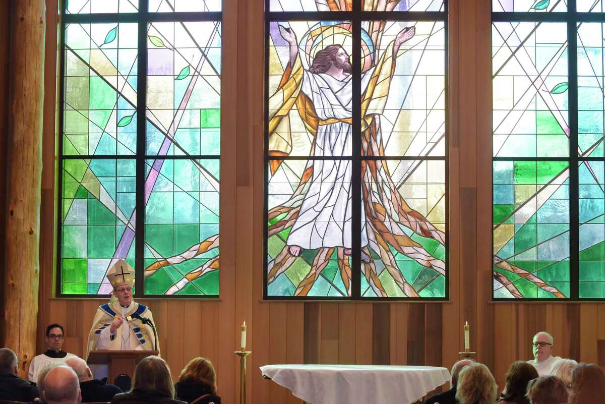Bishop Edward Scharfenberger addresses those gathered for a dedication of the new Mary Immaculate, Patroness of America at Most Holy Redeemer Cemetery Chapel Mausoleum on Thursday, Nov. 30, 2017, in Niskayuna, N.Y. The design of the mausoleum was done in the style of local architect and conservationist Paul Schaefer. The mausoleum has over 1,000 crypts and around 700 niches to hold cremation urns. (Paul Buckowski / Times Union)