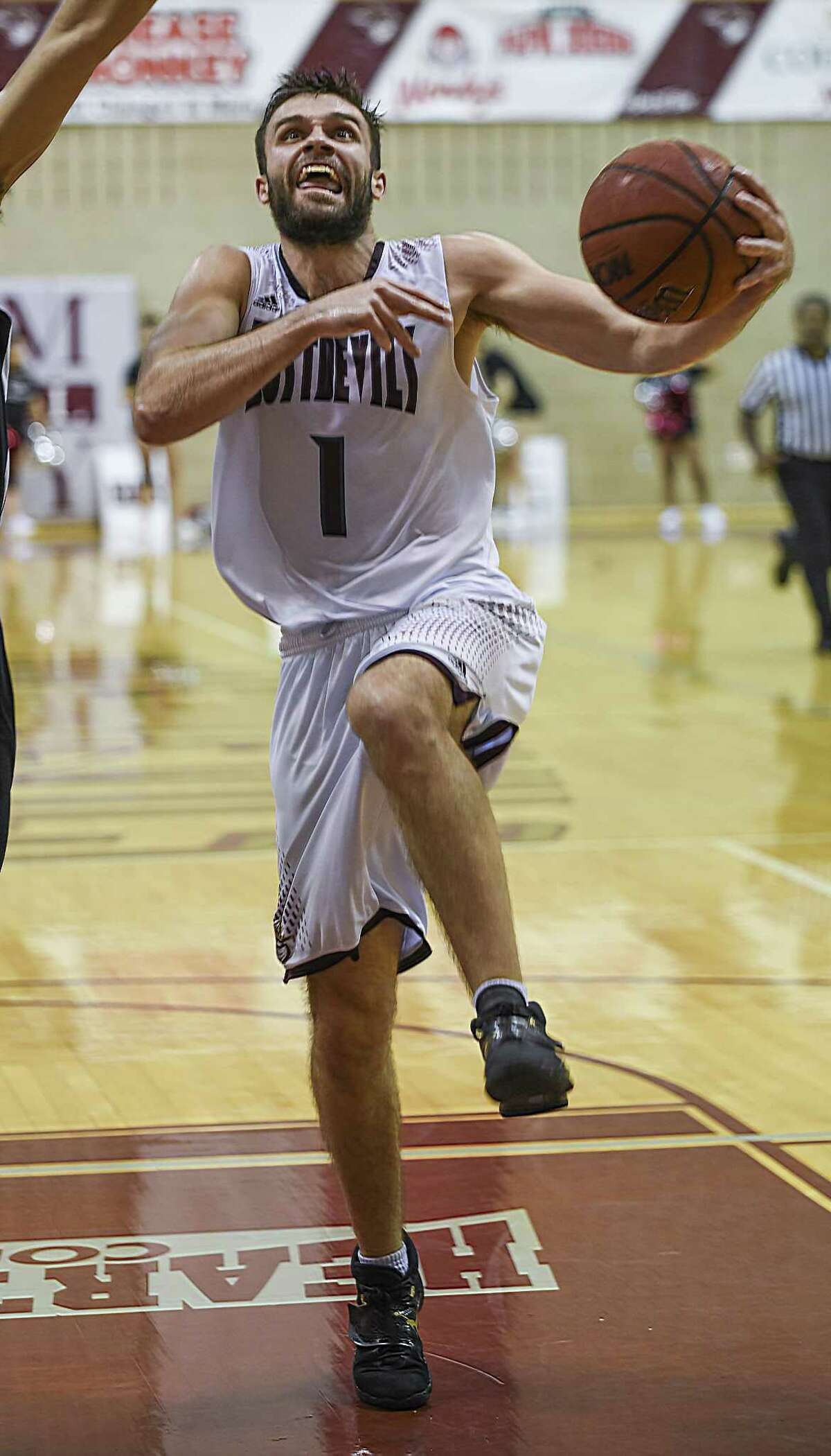 Texas A& International University Danny Spinuzza goes for a layup during a game against Paul Quinn College on Thursday, Nov. 30, 2017 at TAMIU.