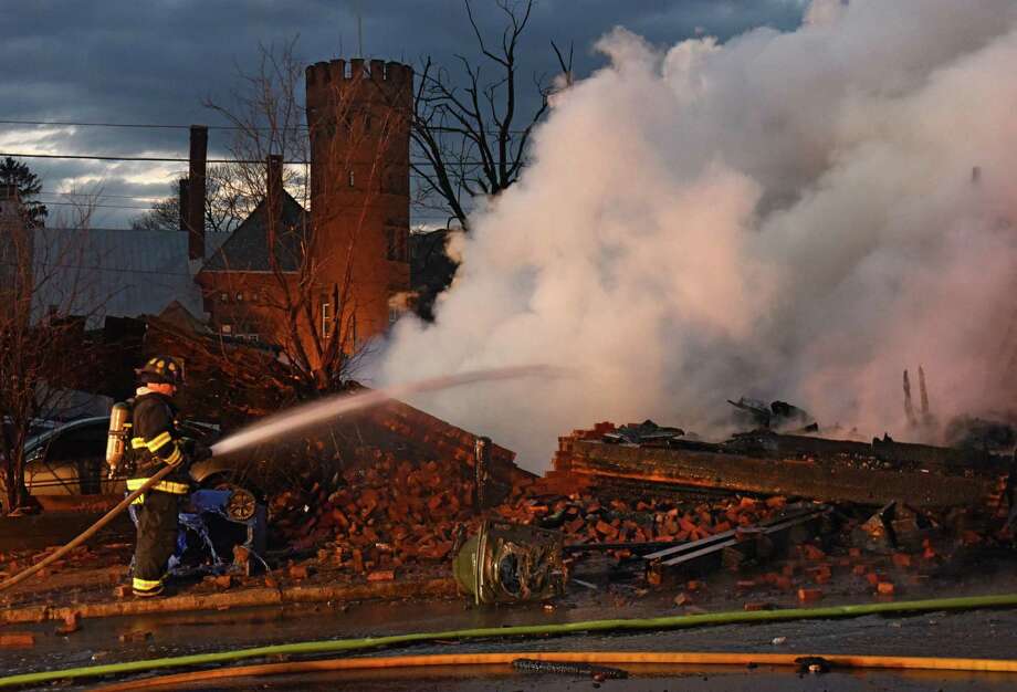 Firefighters from around the region work to control a multi-structure fire on Remsen Street on Thursday, Nov. 30, 2017 in Cohoes, N.Y. (Lori Van Buren / Times Union) Photo: Lori Van Buren / 20042290A