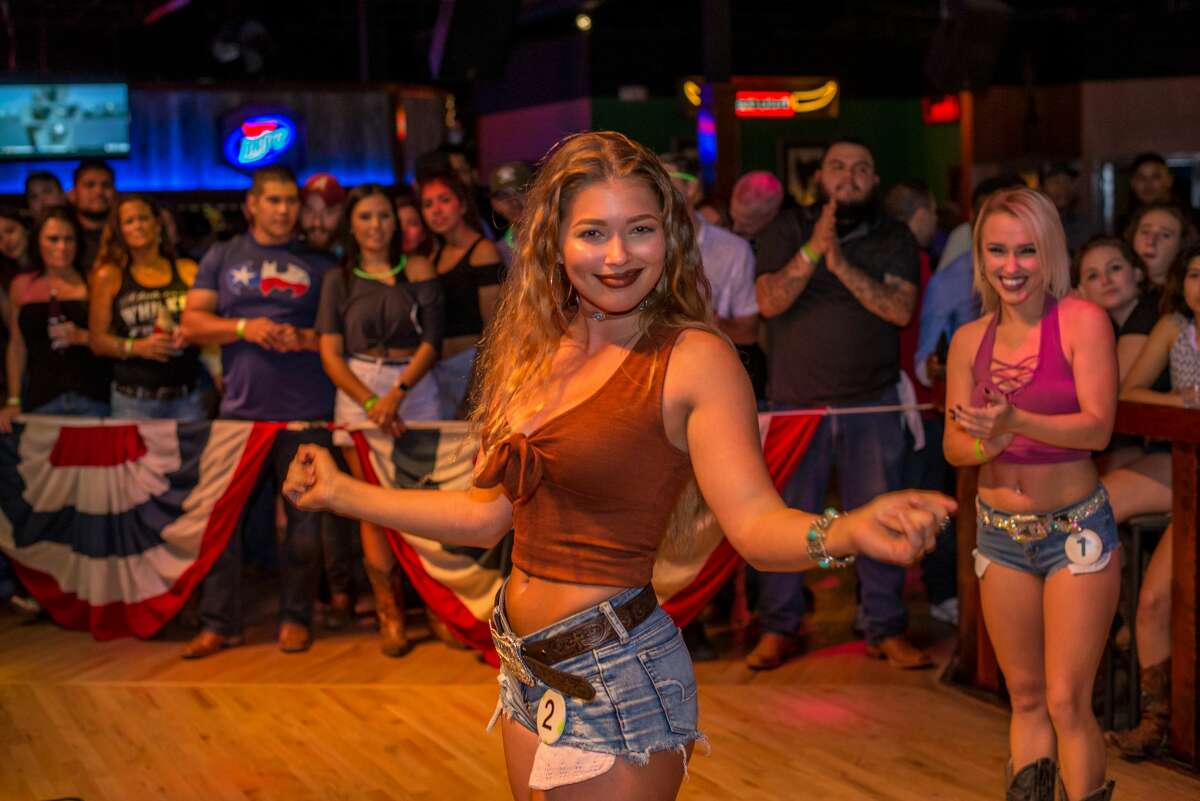 A Daisy Dukes contest with $400 up for grabs called for an array of San Antonio gals rocking cut-offs at San Antonio's Wild West on Thursday, Nov. 30, 2017. A fun crowd twirled the dance floor all night to honor the Stone Oak-area's venue's "two-steppin' & long-neckin'" slogan.