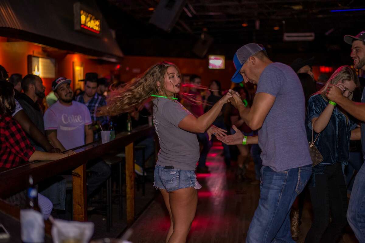 Photos: Daisy Dukes contest, two-stepping heat up San Antonio's Wild West