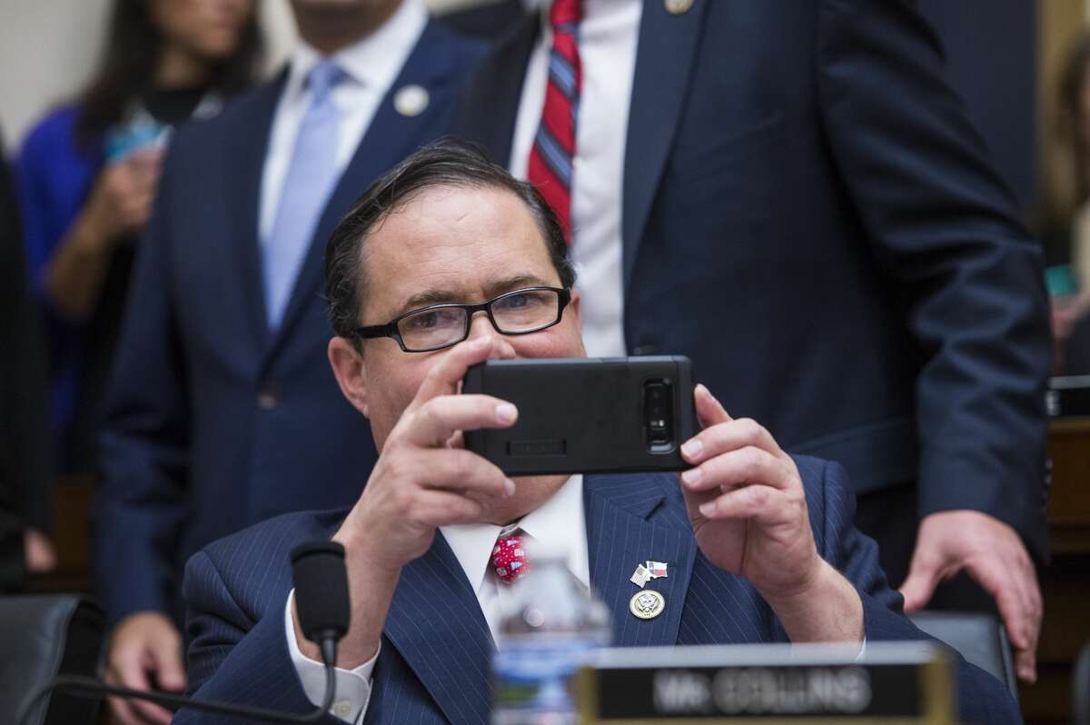 UNITED STATES - NOVEMBER 14: Rep. Blake Farenthold, R-Texas, takes a picture during a House Judiciary Committee hearing in Rayburn Building on November 14, 2017, on oversight of the Department of Justice where Attorney General Jeff Sessions fielded a variety of questions including immigration and Russian meddling in the 2016 election. (Photo By Tom Williams/CQ Roll Call)