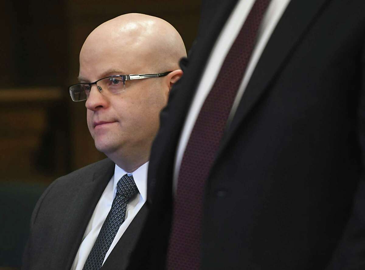 Rensselaer County District Attorney Joel Abelove sits next to his attorney William Dreyer as Columbia County Court Judge Jonathan Nichols indicts him on two official misconduct charges and one charge of 1st degree perjury for his handling of an April 2016 fatal shooting by Troy Police Sgt. Randall French of Edson Thevenin at the Rensselaer County Court House on Friday, Dec. 1, 2017 in Troy, N.Y. (Lori Van Buren / Times Union)
