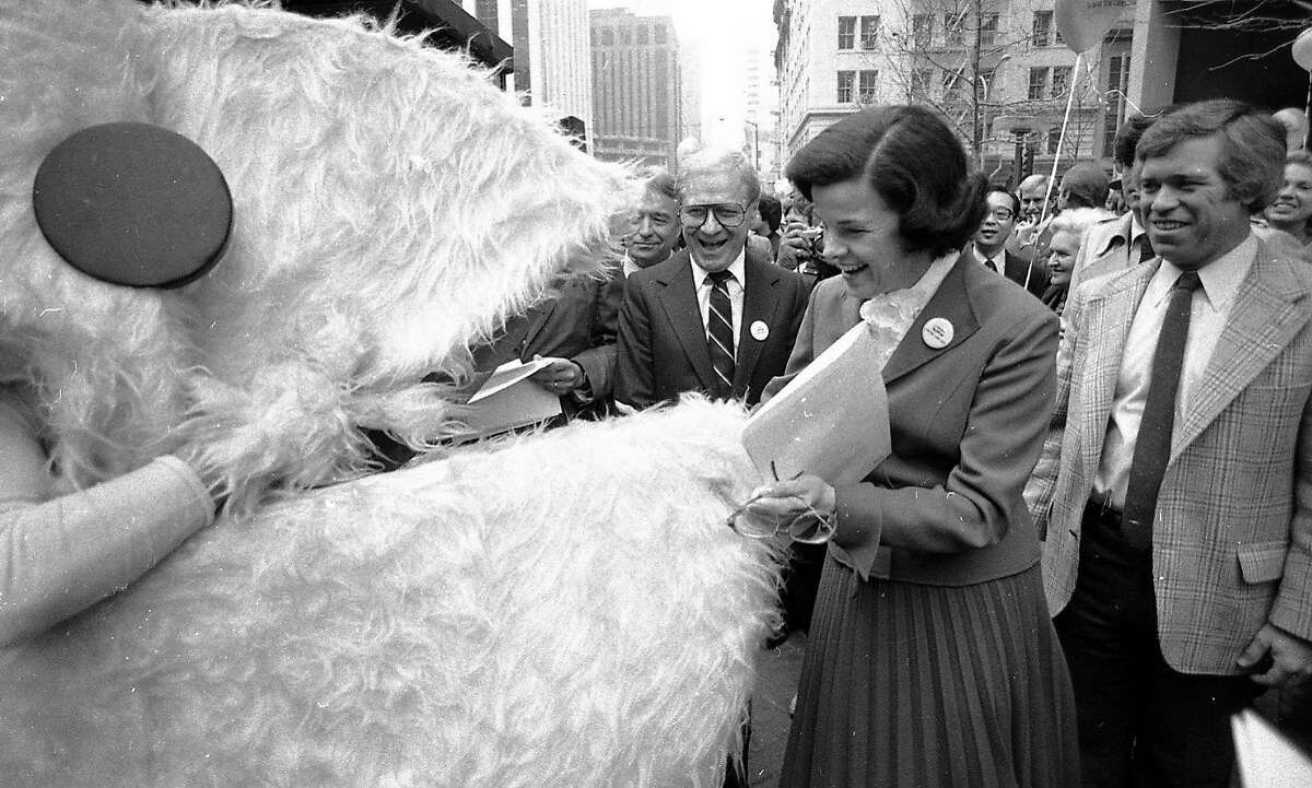March 11, 1982: San Francisco mayor Dianne Feinstein accepts $1 million from Atari Corp. to the Save the Cable Cars fund. She tested am Atari computer and met a life-size Pac-Man character.