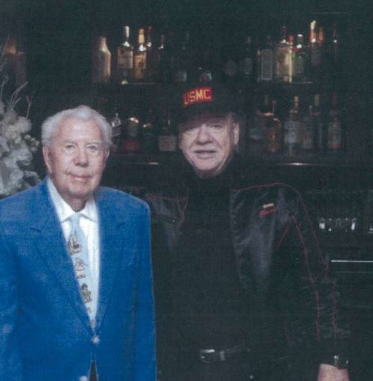 Mort Walkter (left) and Stewart Jacobson (right) at a Toys for Tots lunch at the 21 Club in New York City in 2015.