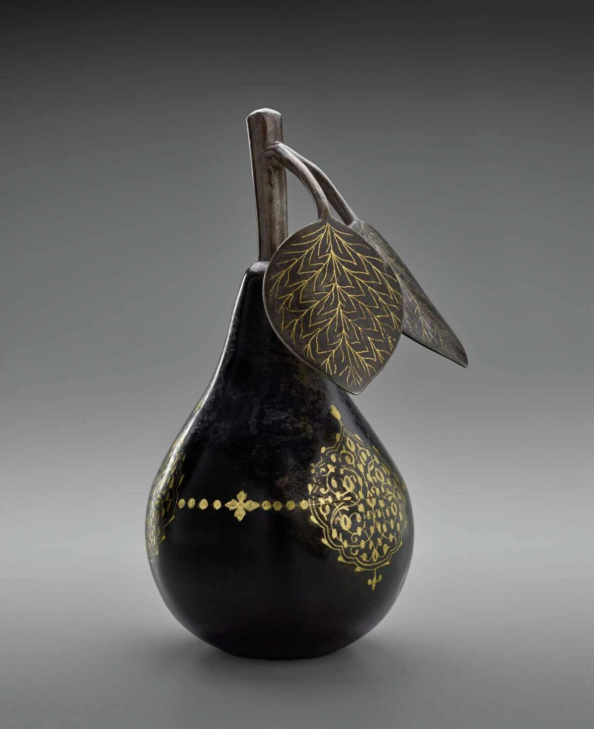Among objects on view in "Bestowing Beauty: Masterpieces from Persian Lands":Â Pear, Iran, 19th century, steel, inlaid with gold.