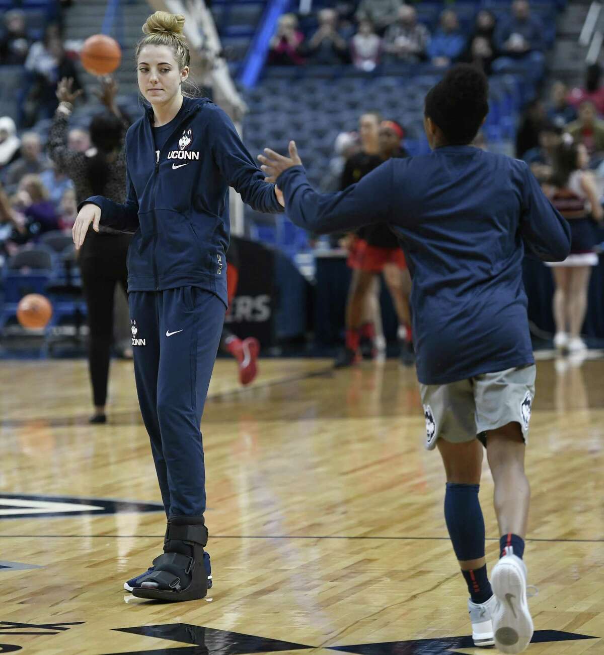 UConn’s Katie Lou Samuelson, left, is expected to be back on the court for Sunday’s meeting with No. 3 Notre Dame.