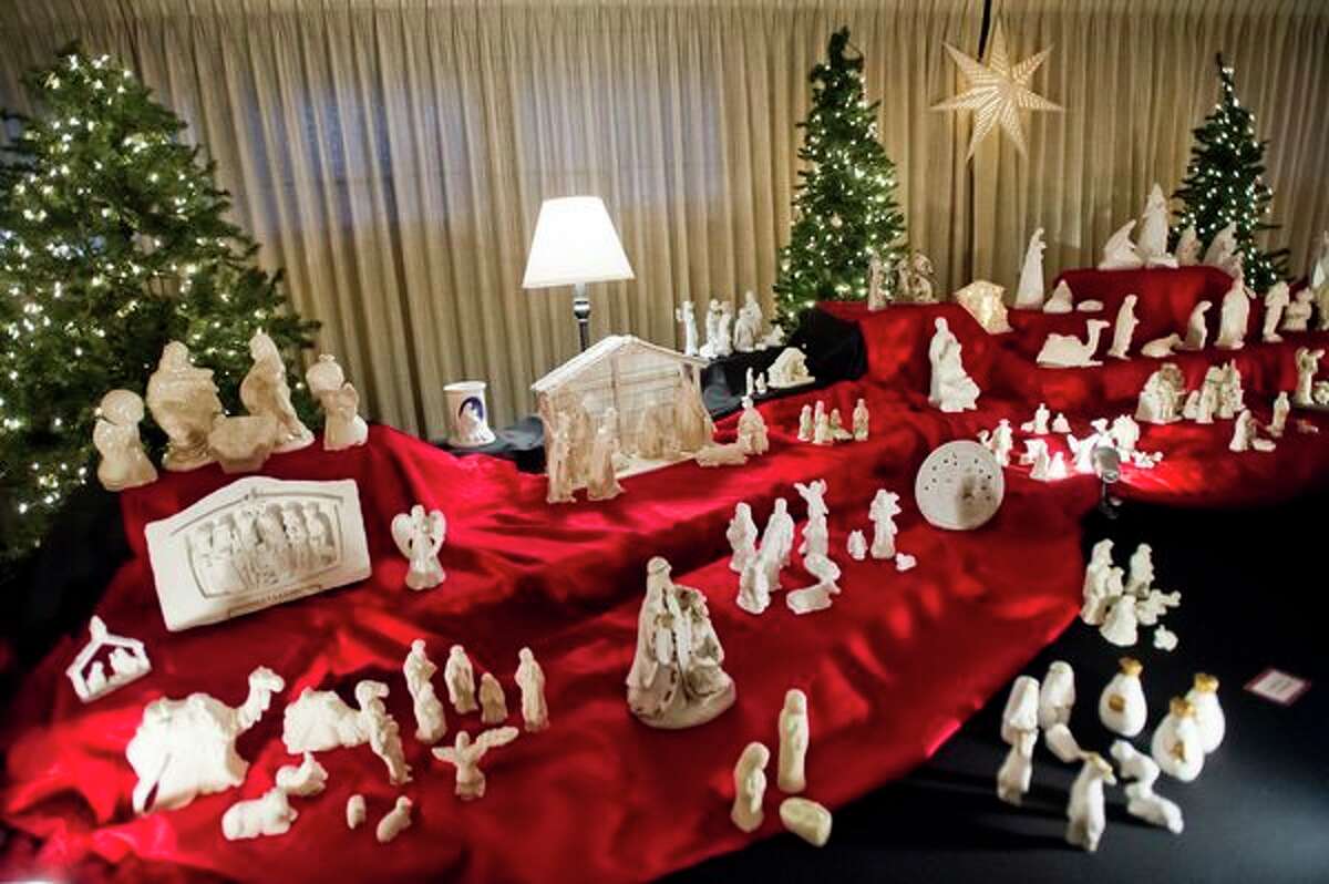 White nativity scenes are on display at the Church of Jesus Christ of Latter-day Saints as part of the annual nativity exhibit, which features over 900 nativities, on Friday. The exhibit is open Friday through Sunday, from 11 a.m. until 9 p.m. Admission is free. (Katy Kildee/kkildee@mdn.net)
