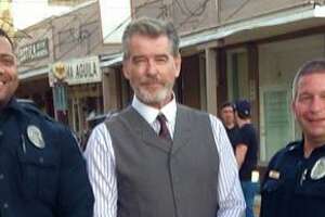 Pierce Brosnan stops to take a photo with Gonzales police during filming of "The Son"