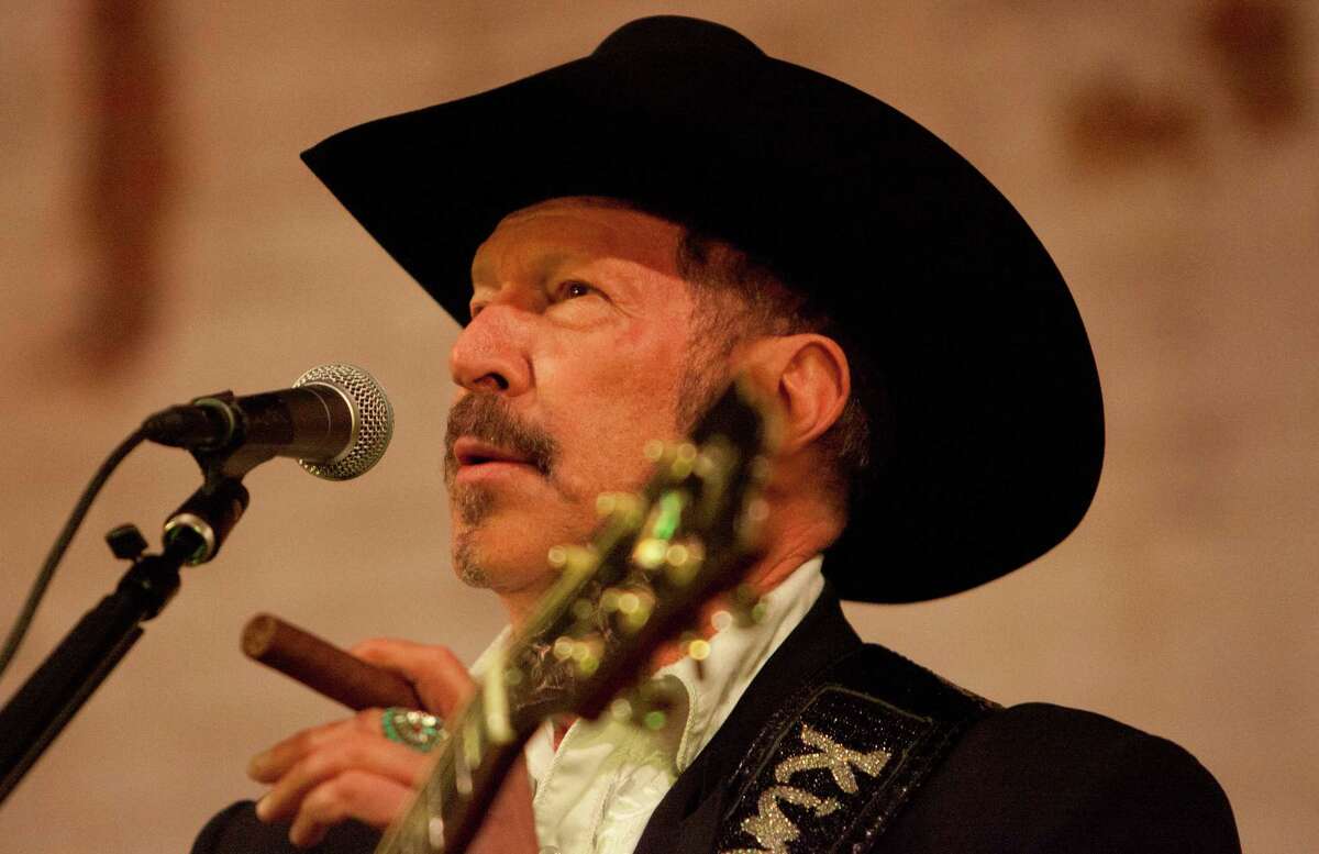 Texas Agriculture Commissioner candidate Kinky Friedman performs with his band Kinky Friedman & the Texas Jewboys at the Historic Sparkle Icehouse Event Hall in Conroe on Saturday.
