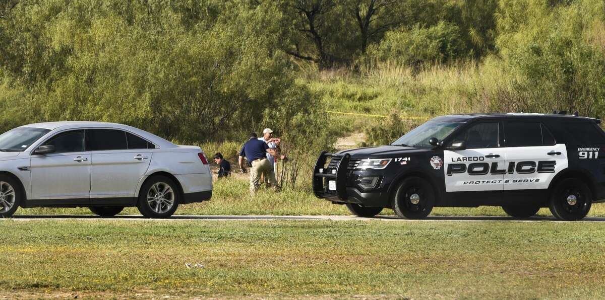 Authorities assess the scene where a deceased person was found at Cheyenne Park.
