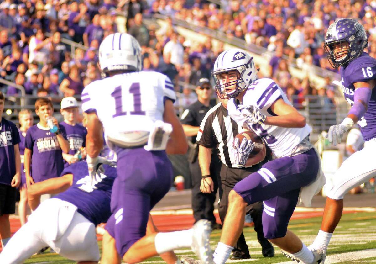 Port Neches-GrovesÂ?’ Preston Riggs sprints toward the goal line after a first half reception during SaturdayÂ?’s game with College Station at Turner Stadium in Humble. (Mike Tobias/The Enterprise)