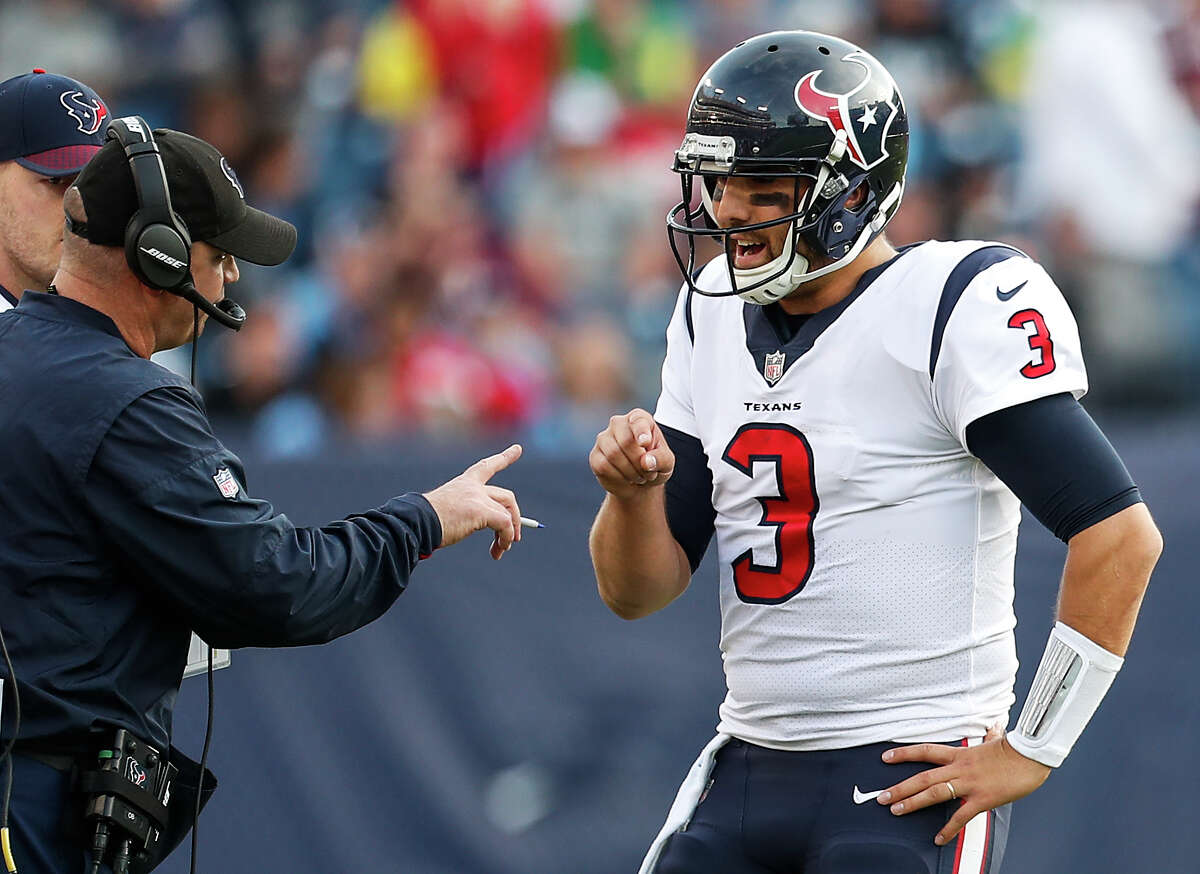 Houston Texans head coach Bill O'Brien talks to Houston quarterback Tom Savage (3) during a time out in the fourth quarter of an NFL football game against the Tennessee Titans at Nissan Stadium on Sunday, Dec. 3, 2017, in Nashville.