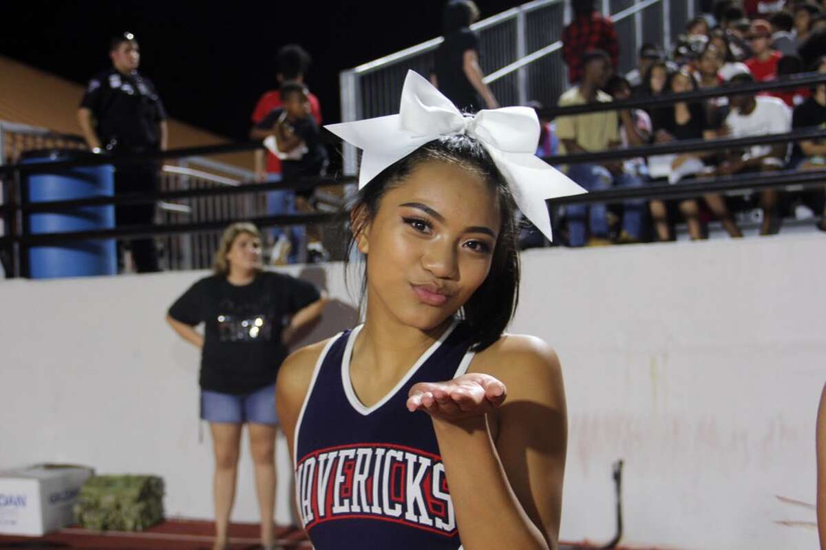 The video where Manvel High School cheerleader, Ariel Olivar, steps over an invisible box has gone viral. Since the original Tweet on Dec. 1, the video had been retweeted more than 80,000 times. Browse through the photos for the best reactions to Ariel's stunt. 