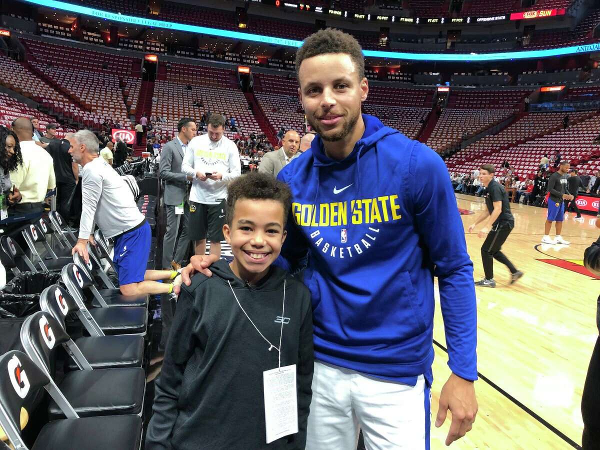Malichi Sims, 11, met his hero Stephen Curry after a video of him crying while receiving Warriors tickets went viral.