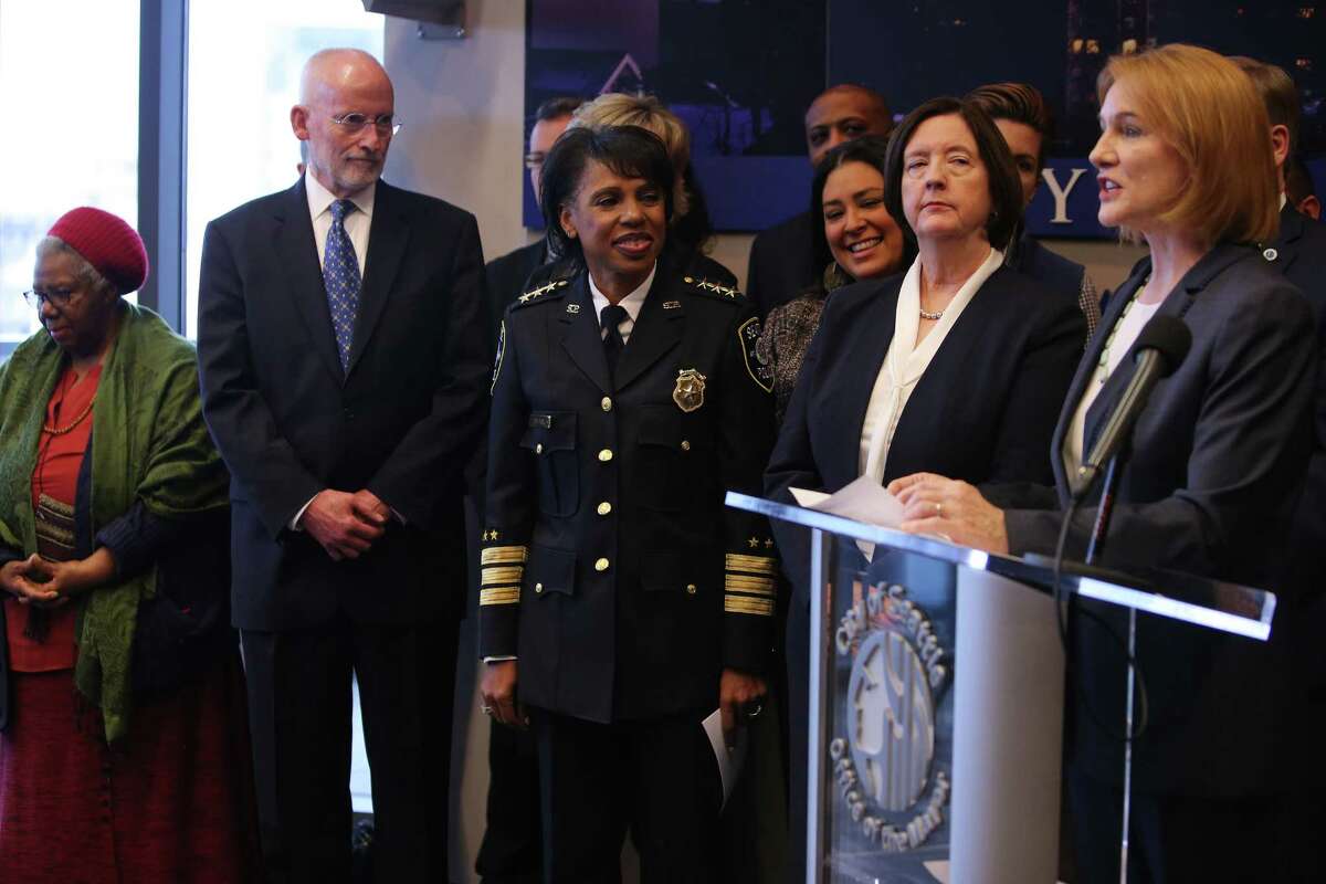 Seattle Mayor Jenny Durkan announces the search for a new chief of police as Kathleen O'Toole, center-right, steps down from the position she has held for three and a half years. Deputy Chief Carmen Best, center, is interim chief.  U.S. District Judge James Robart gave O'Toole much credit for bringing the SPD and community together and putting Seattle in compliance with a Justice Department consent decree.