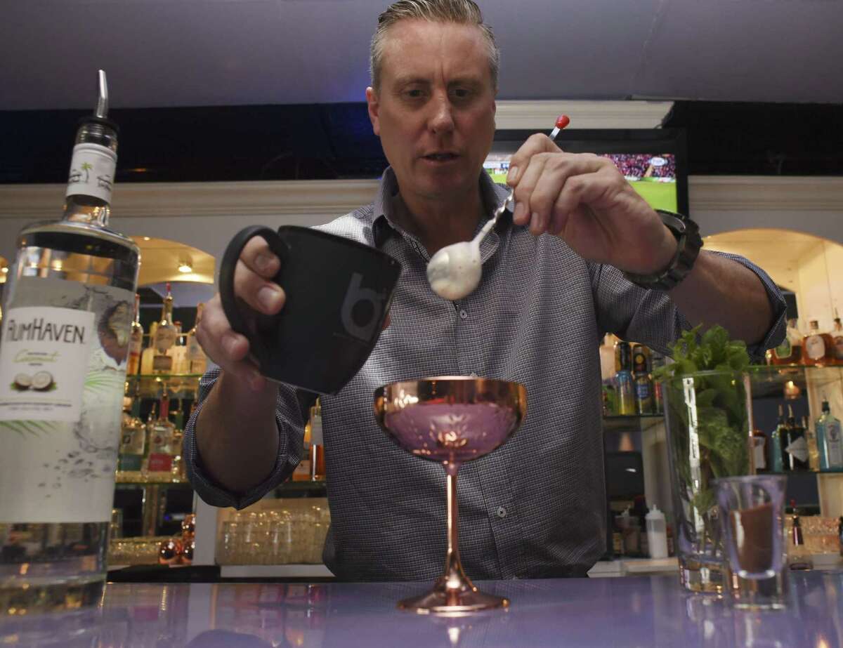 James English of Breathe Lounge on Broadway prepares an Espresso Warmer cocktail, which mixes espresso with a blend of liqueurs.