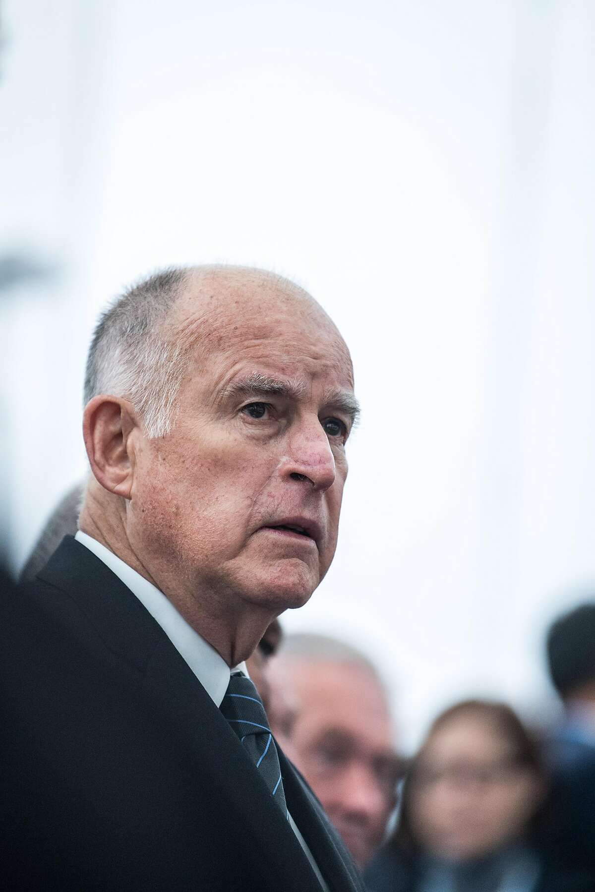 BONN, GERMANY - NOVEMBER 11: California Governor Jerry Brown joins a discussion at the America's Pledge launch event at the U.S. "We Are Still In" pavilion at the COP 23 United Nations Climate Change Conference on November 11, 2017 in Bonn, Germany. America's Pledge is a report detailing the efforts of U.S. states, cities and businesses to keep America on line in fulfilling goals towards carbon reduction set out by the Paris Climate Agreement. U.S. President Donald Trump has announced that the U.S. is withdrawing from the accord and the White House is sending its own delegation of fossil fuel supporters to the COP 23 conference next week to make the case for the continued role of coal and petroleum in world energy needs. (Photo by Lukas Schulze/Getty Images)