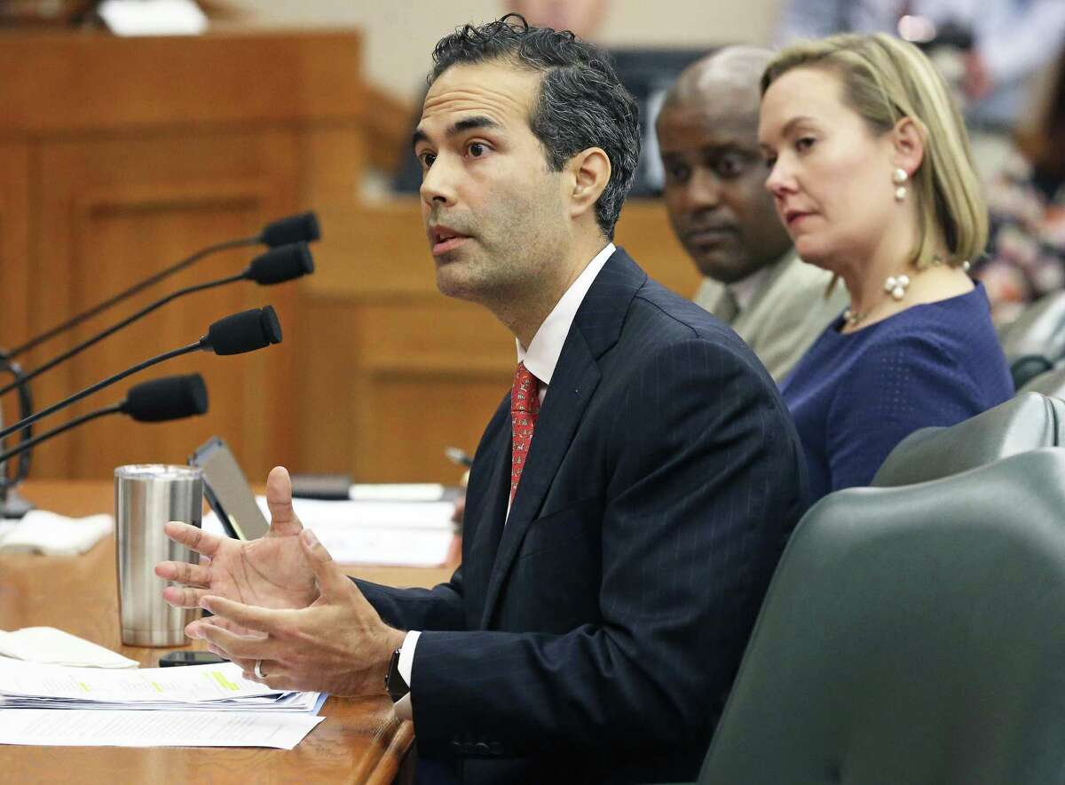 Land Commissioner George P. Bush, with Deputy Land Commissioner Anne Idsal, answers question Tuesday as the Senate Finance Committee takes up expenditures on the Alamo by the General Land Office.
