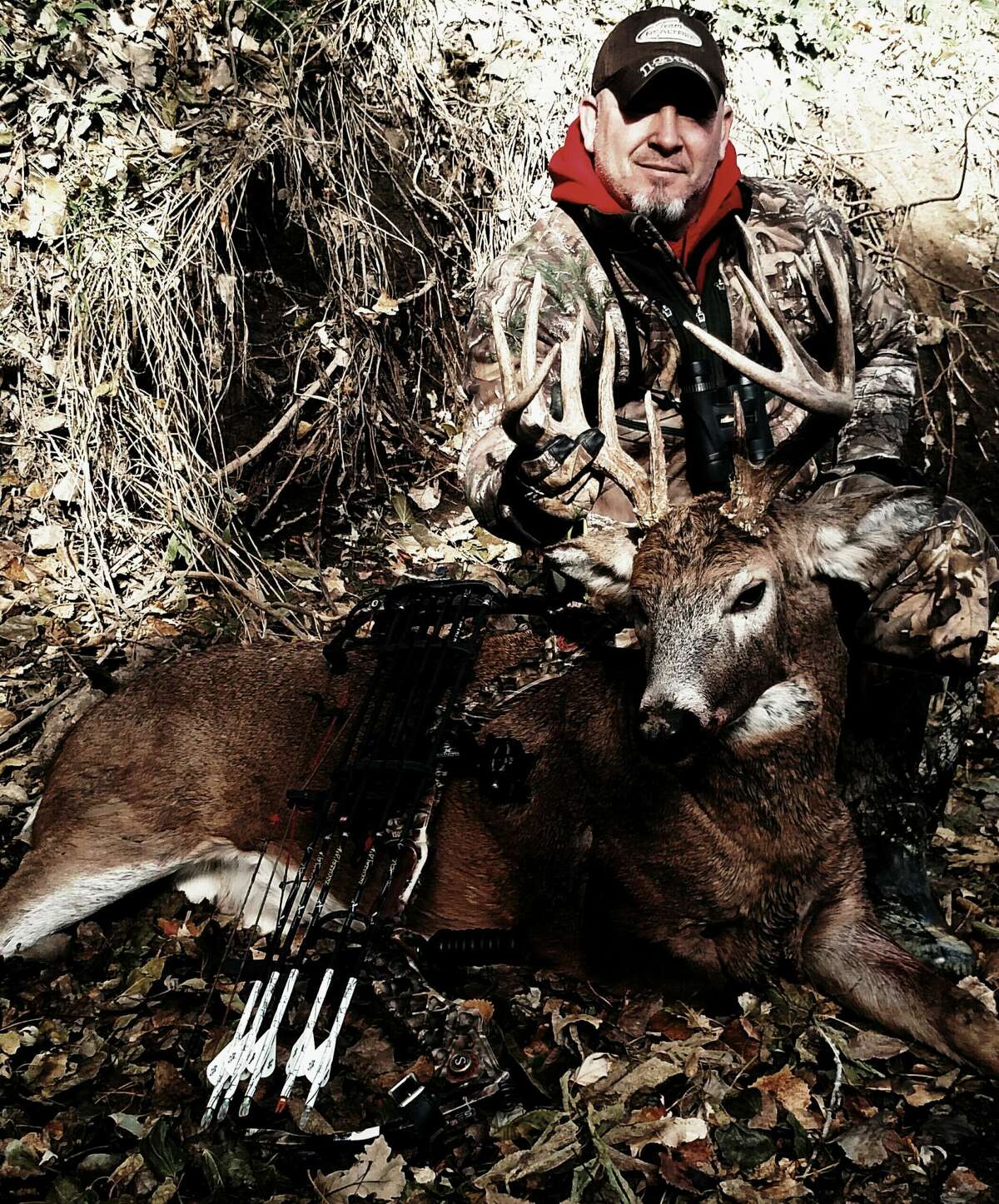 Brent Clark of Sanford is shown with a deer harvested in a past year.