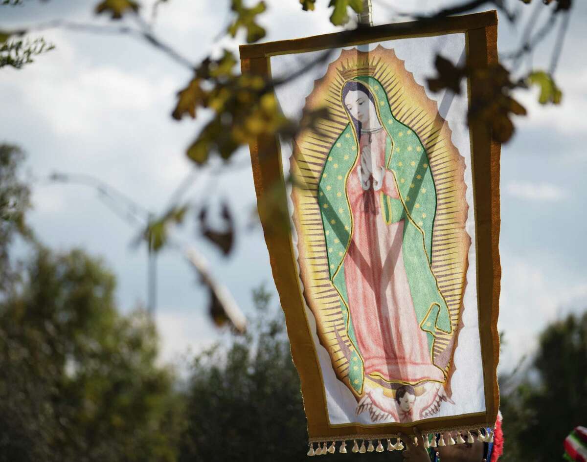 The Faithful Honor The Virgen De Guadalupe As The Patroness Of The Americas