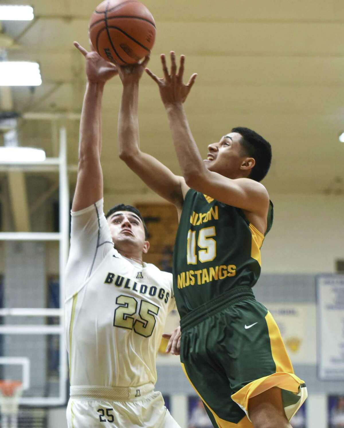 Jonathan Garcia hit a layup with two seconds remaining in regulation to force overtime then made the game winner in double overtime as Nixon won 89-87 at Alexander Tuesday.
