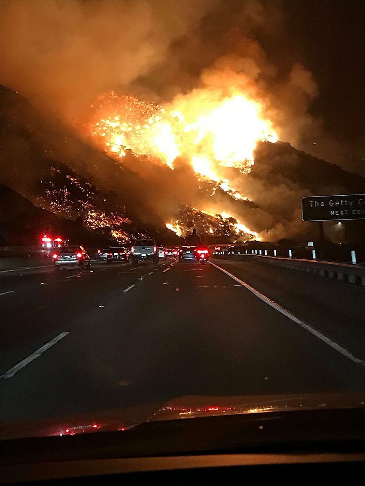 A view of the Skirball Fire from southbound 405. The fire is tearing through Bel-Air and forcing mandatory evacuations in the area.
