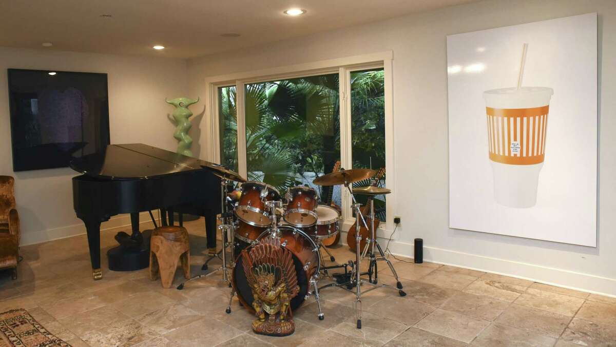 Just right of the front door of the Olmos Park home where Ana Montoya and Gobie Walsdorf live is a “music room” with a drum set and piano. “My whole family is musical, mainly jazz and blues,” Walsdorf said.