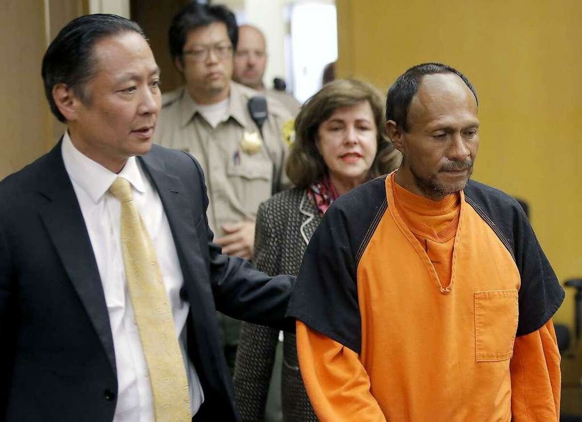 Jose Ines Garcia Zarate, right, is led into a courtroom by San Francisco Public Defender Jeff Adachi, on July 7, 2015.
